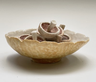 Lot 954 - A porcelain sculpture of mushrooms in a bowl...