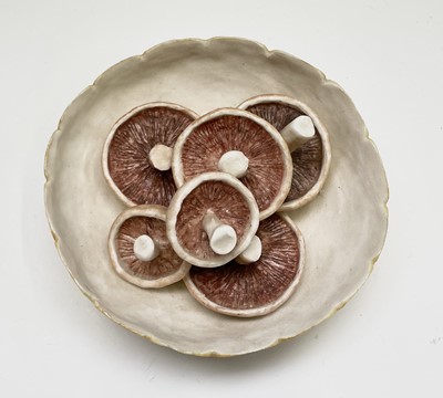 Lot 954 - A porcelain sculpture of mushrooms in a bowl...