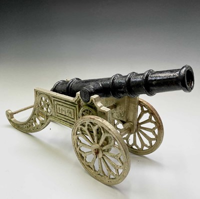 Lot 259 - A pair of decorative cast iron model cannon,...
