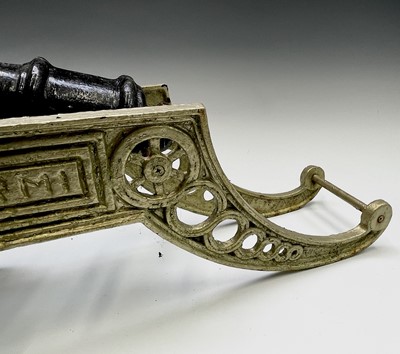 Lot 259 - A pair of decorative cast iron model cannon,...