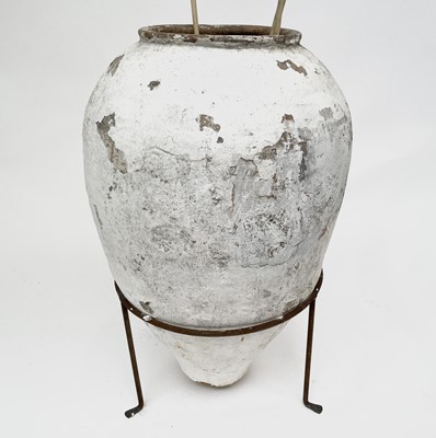 Lot 276 - A large white painted terracotta olive jar,...