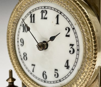 Lot 2913 - A German brass torsion clock, circa 1900, the...