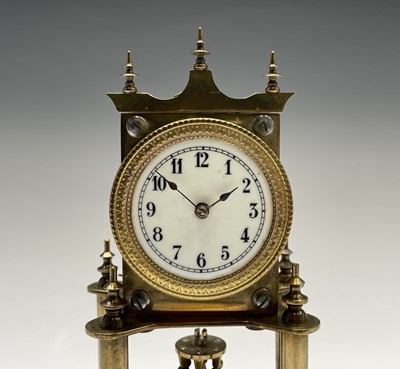 Lot 2913 - A German brass torsion clock, circa 1900, the...