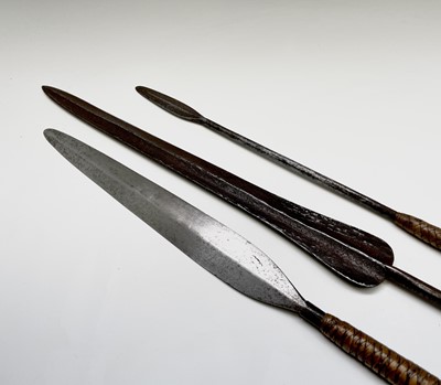 Lot 280 - Three assorted African spears, two with rattan...