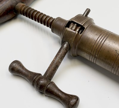 Lot 413 - A 19th century brass barrel corkscrew, the...