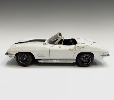 Lot 125 - A Burago diecast 1957 Chevrolet, together with...