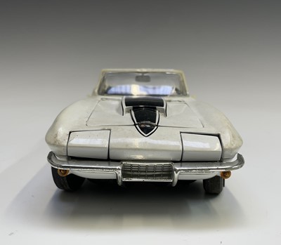 Lot 125 - A Burago diecast 1957 Chevrolet, together with...
