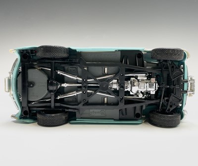 Lot 125 - A Burago diecast 1957 Chevrolet, together with...