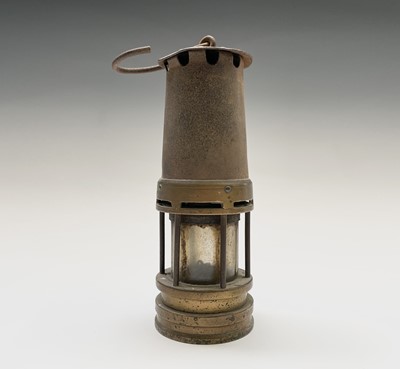 Lot 300 - Two 19th century brass and steel miners lamps,...