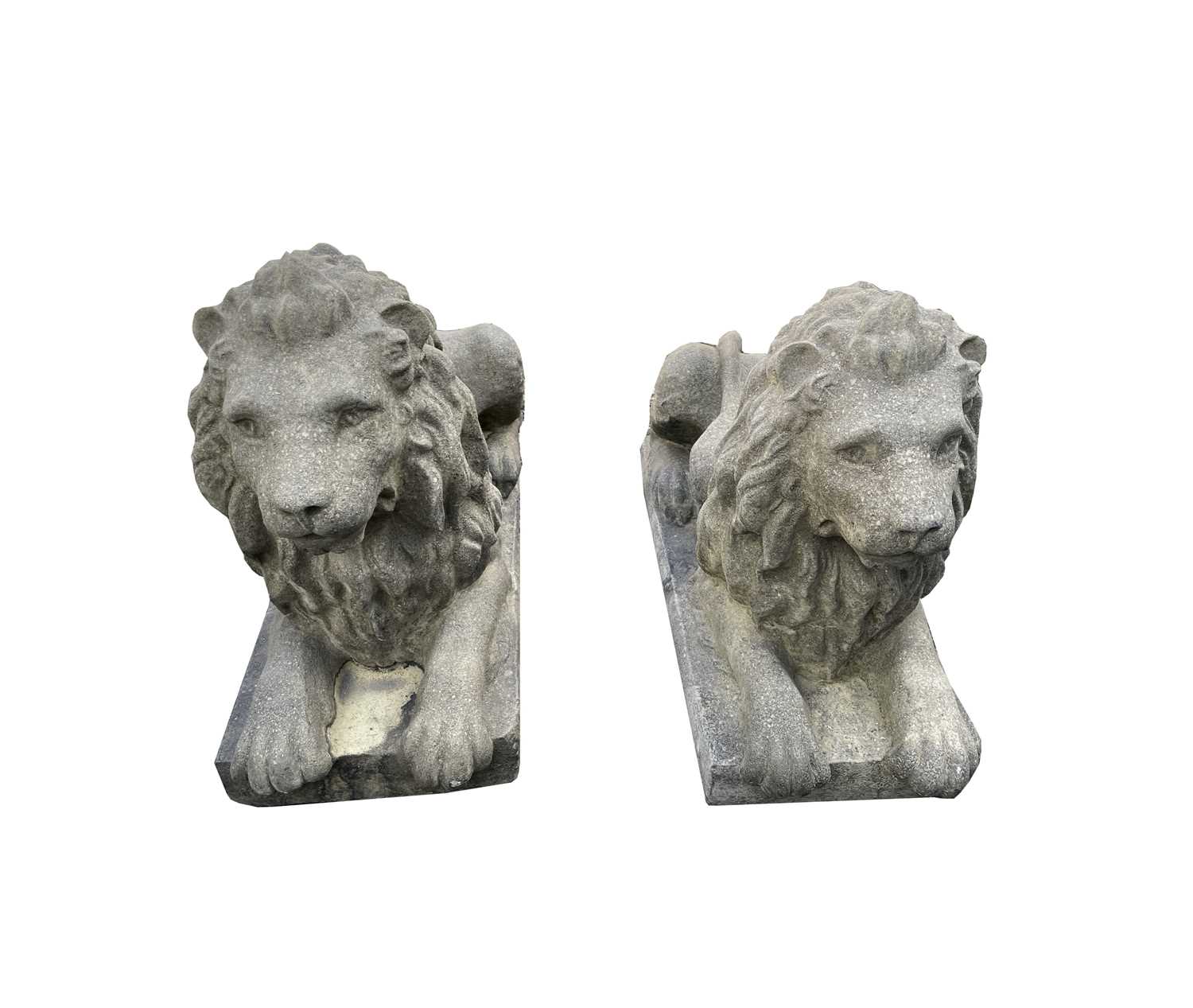 Lot 650 - A large pair of reconstituted stone recumbent...