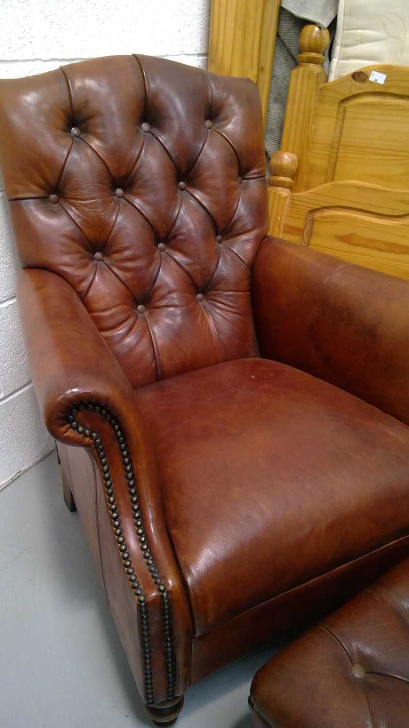 Lot 17 A good quality leather button back armchair