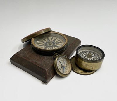 Lot 565 - A Victorian brass pocket compass, with...