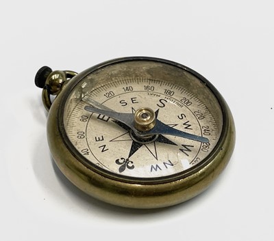 Lot 565 - A Victorian brass pocket compass, with...