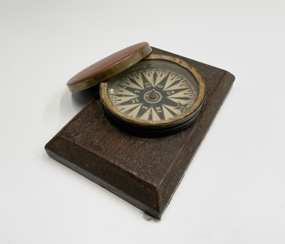 Lot 565 - A Victorian brass pocket compass, with...