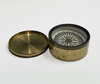 Lot 565 - A Victorian brass pocket compass, with...