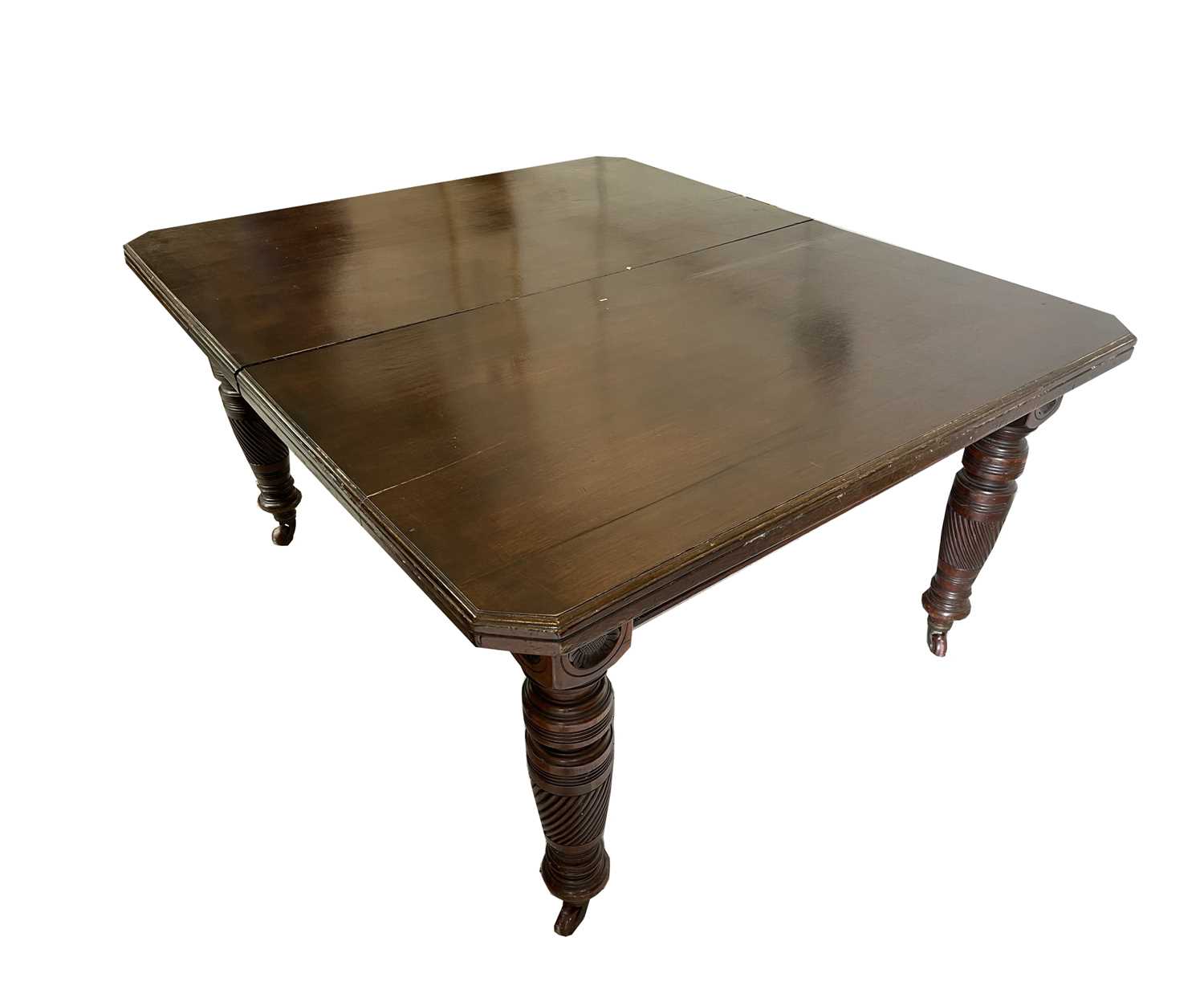 Lot 3125 - An Edwardian walnut extending dining table,...