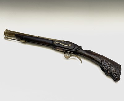 Lot 314 - A reproduction brass mounted flintlock...