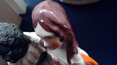 Lot 968 - A Staffordshire figure of Topsy and Eva, circa...