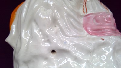 Lot 968 - A Staffordshire figure of Topsy and Eva, circa...