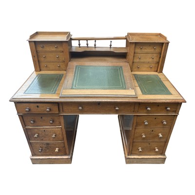 Lot 3387 - A Victorian light oak twin pedestal desk, the...