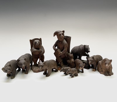 Lot 318 - A Black Forest carved bear match holder,...