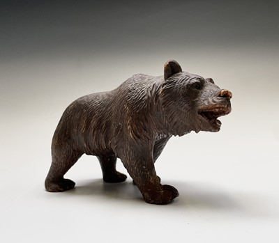 Lot 319 - A Black Forest carved figure of a bear, with...