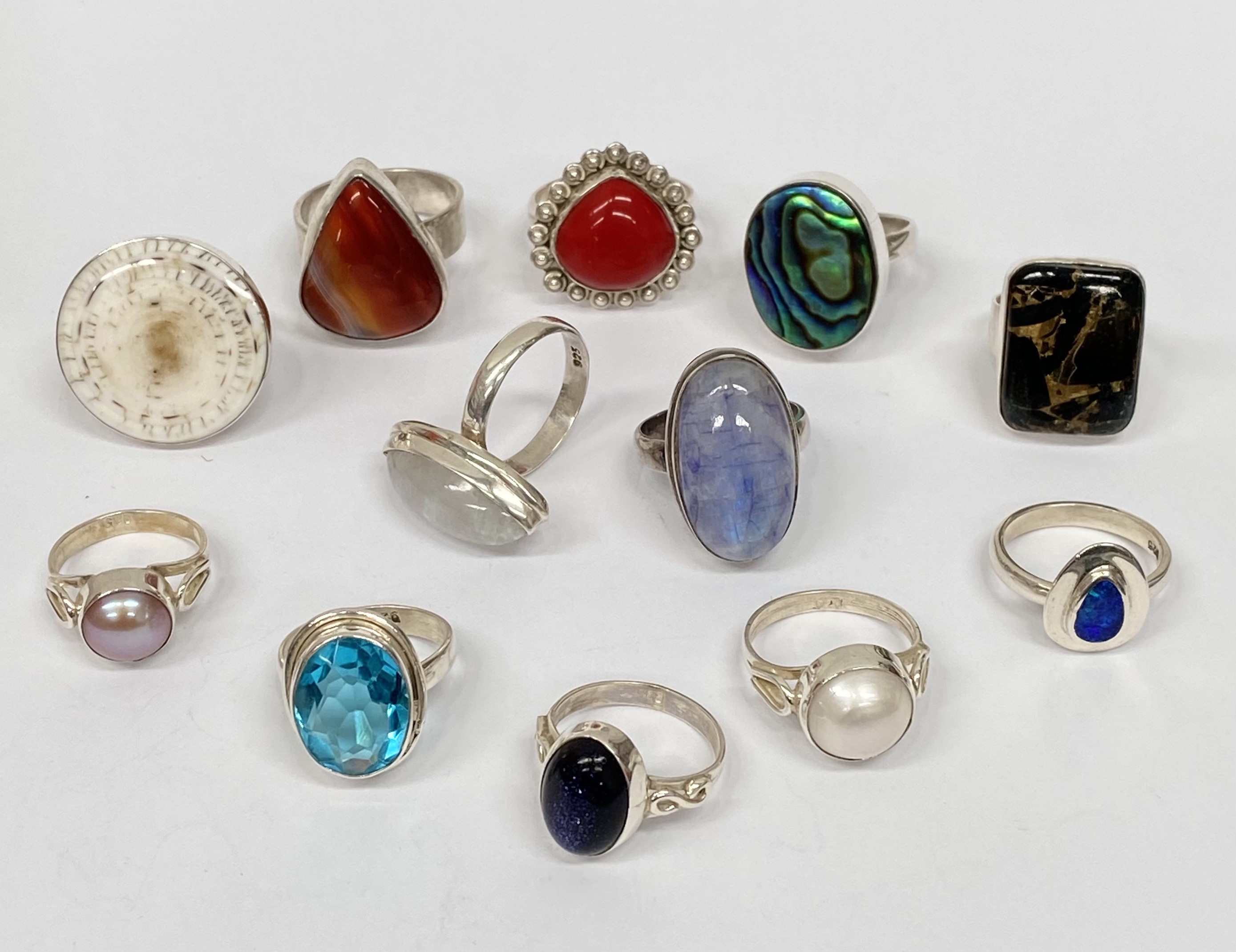 Lot 6 - Various stone set silver rings.