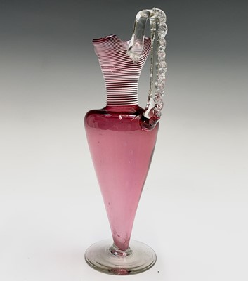 Lot 975 - A Victorian cranberry glass vase with white...