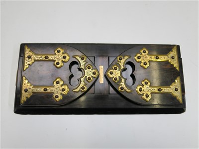 Lot 74 - A Victorian coromandel bookslide, with gilt...