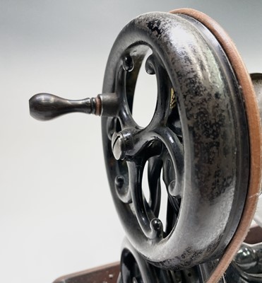 Lot 370 - A 'Wilcox & Gibbs Sewing Machine Co.' sewing...
