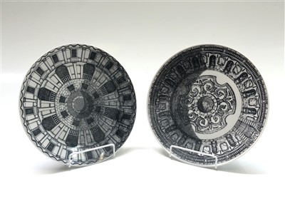 Lot 924 - Two Fornasetti 'Cortili' plates decorated with...