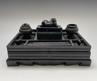 Lot 1018 - A Ceylonese ebonised desk stand, late 19th...