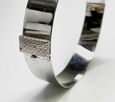 Lot 189 - Four modernist bangles in cast aluminium,...