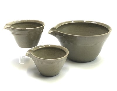 Lot 961 - A set of three Nic Harrison green-glaze...