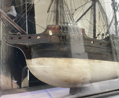 Lot 381 - A model of a three-masted sailing ship, 20th...