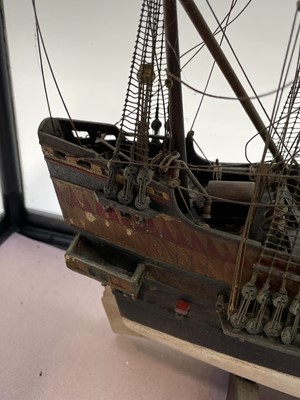 Lot 381 - A model of a three-masted sailing ship, 20th...