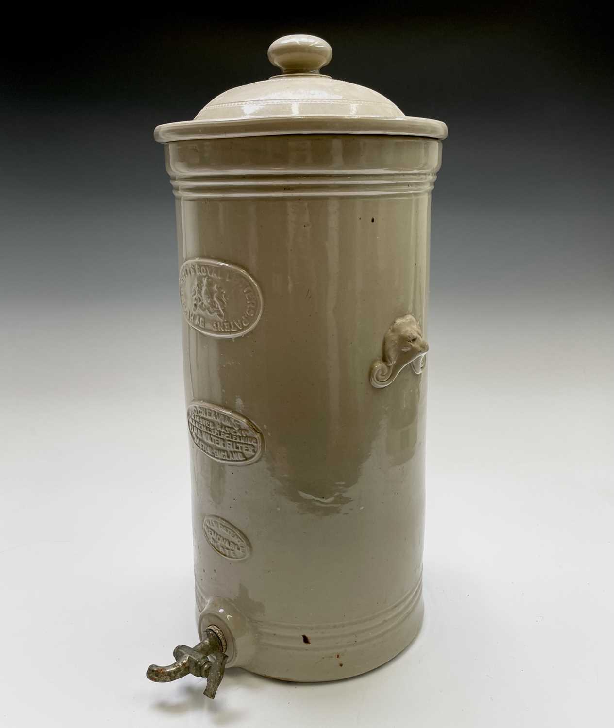 Lot 393 - A G Cheavin's of Boston stoneware water filter...