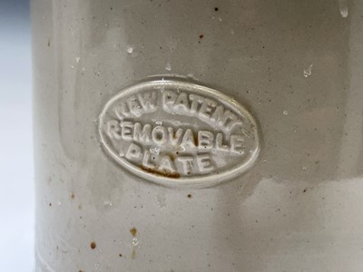Lot 393 - A G Cheavin's of Boston stoneware water filter...