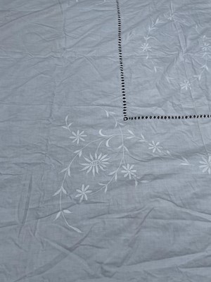 Lot 2845 - A white cotton counterpane with floral...