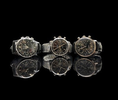 Lot 212 - Three black dial chronograph gentleman's...