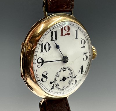 Lot 100 - A 9ct gold trench wristwatch 32mm diameter...