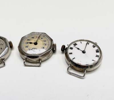 Lot 29 - Four ladies silver cased trench style watches.