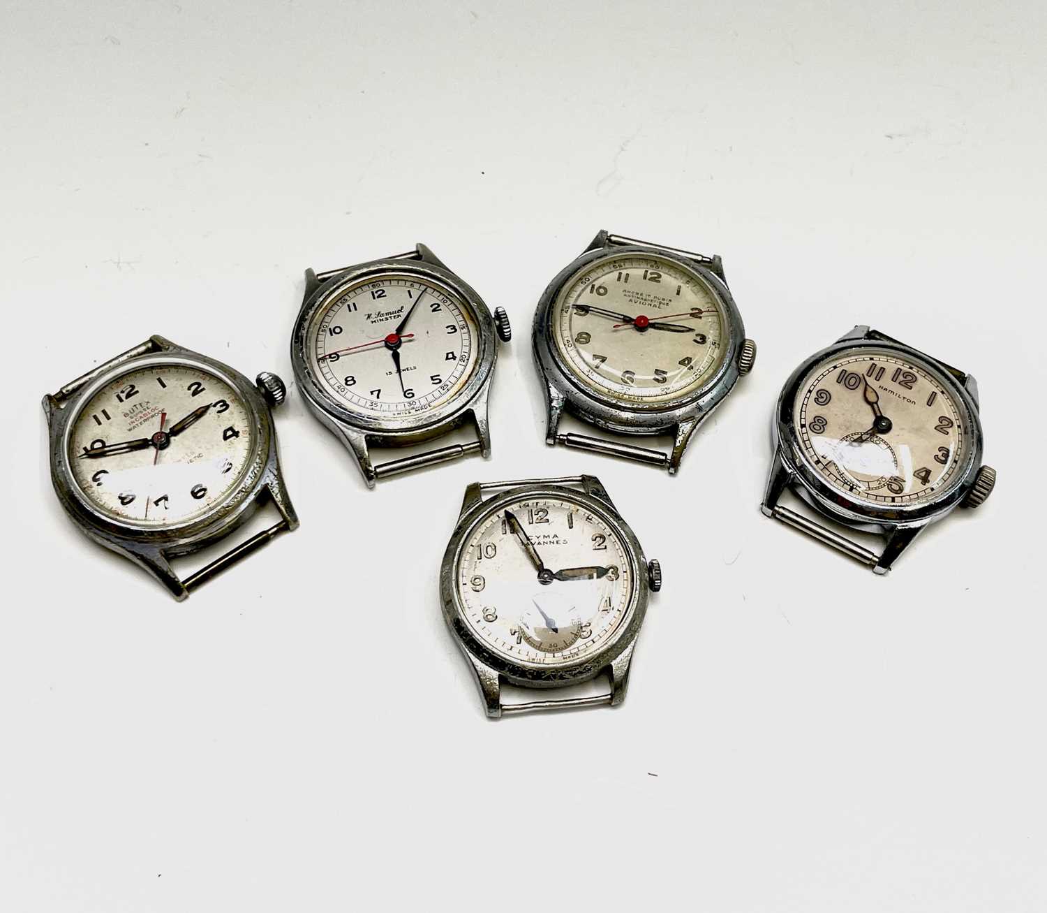 Lot 54 - Five nickel-plated military-style wristwatches,...