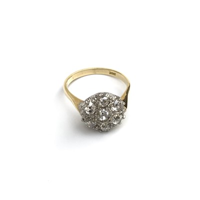 Lot 2637 - An impressive 18ct gold, seven diamond flower...