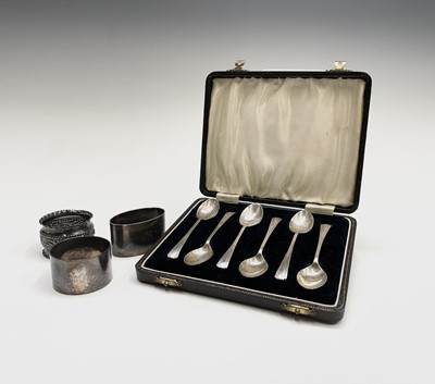 Lot 380 - Three silver napkin rings together with a...