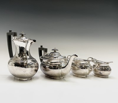 Lot 350 - An epns four piece tea service with gadrooned...