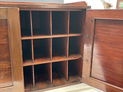 Lot 153 - A mahogany country house postage rack/cupboard,...