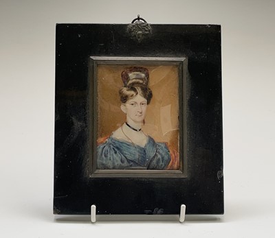 Lot 305 - A miniature portrait of a Regency lady with...