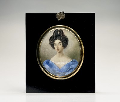 Lot 333 - A miniature portrait of a Regency lady with...