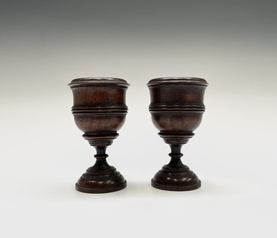 Lot 154 - A pair of Victorian turned treen goblets,...